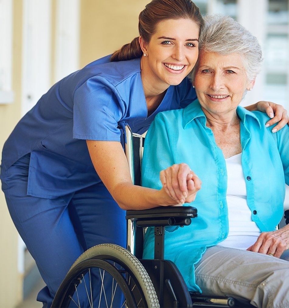 A caregiver helping a senior review a clearly organized medication schedule